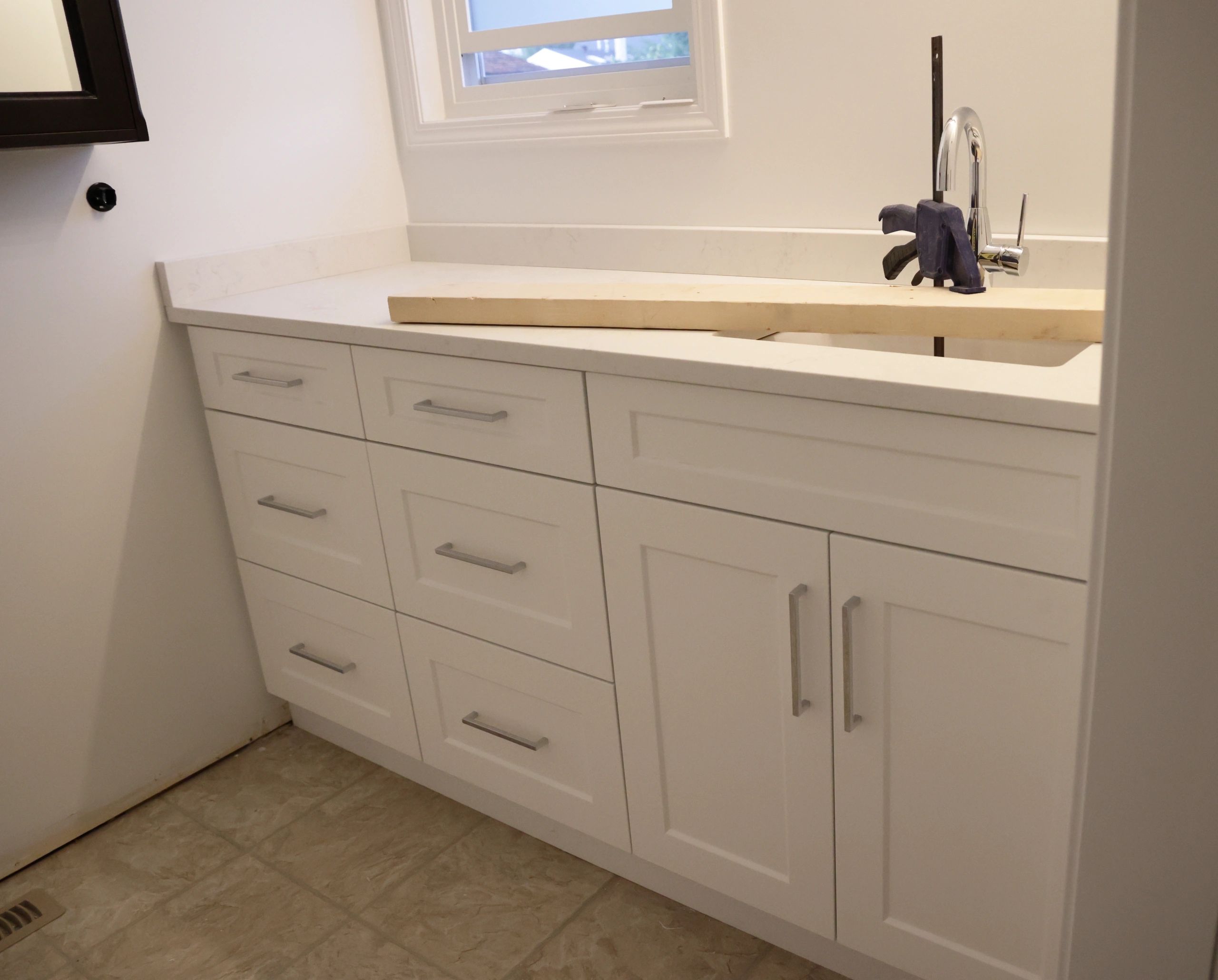 Custom vanity and countertop installed during renovation