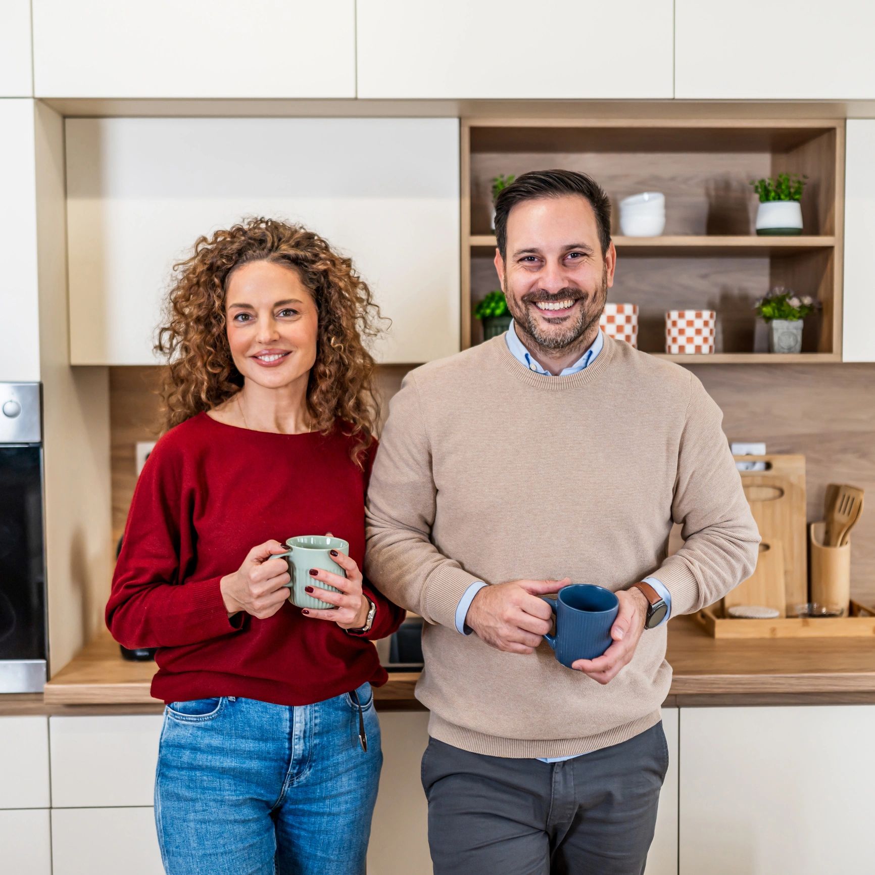 Smiling couple in a modern kitchen